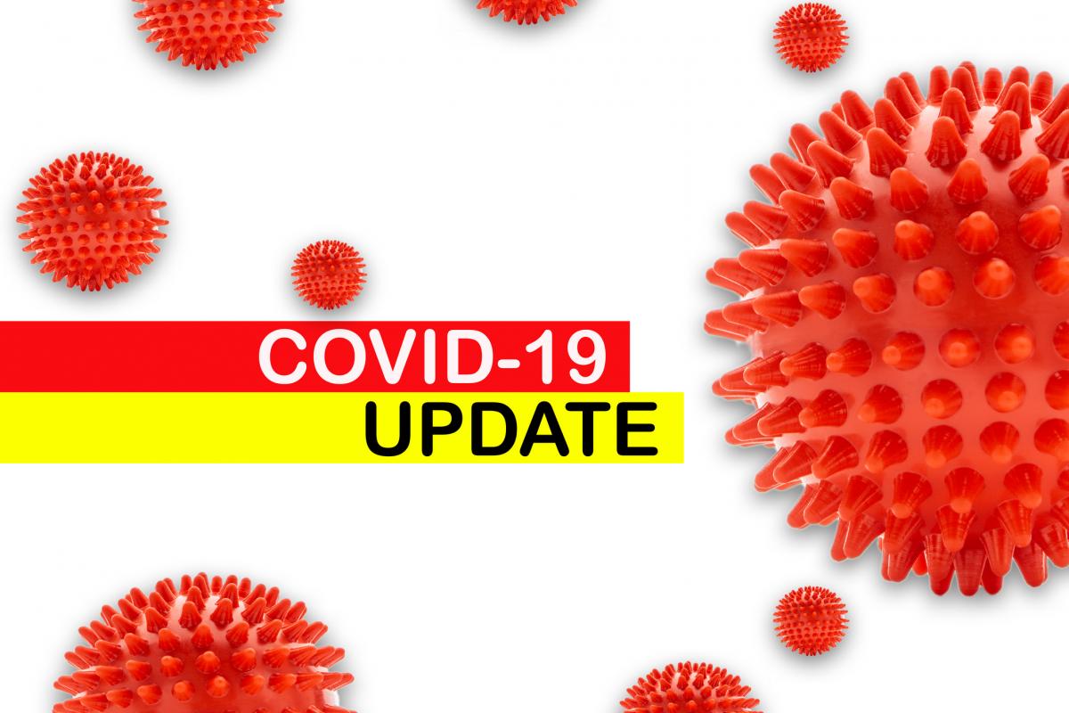 Picture of COVID-19 with text saying COVID-19 update